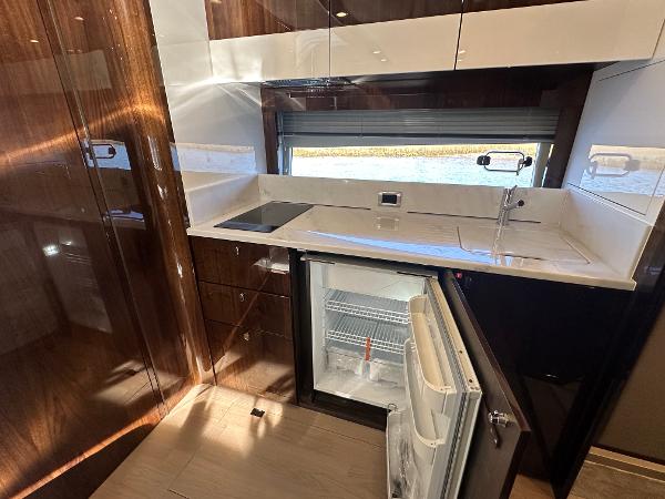 Slide: The Image of Modern kitchen in 2024 Fairline Targa 45 Open yacht with open fridge. - 21
