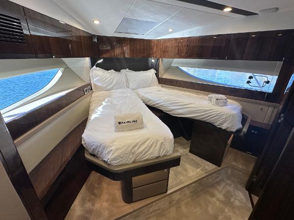 Slide: The Image of Luxurious cabin interior of 2024 Fairline Targa 45 Open yacht with twin beds. - 22