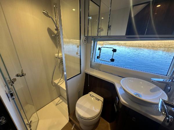 Slide: The Image of Modern bathroom in 2024 Fairline Targa 45 Open yacht with shower, toilet, and sink. - 25