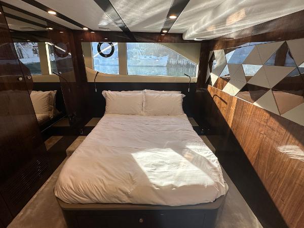 Slide: The Image of Luxurious bedroom interior of 2024 Fairline Targa 45 Open yacht with modern design. - 28