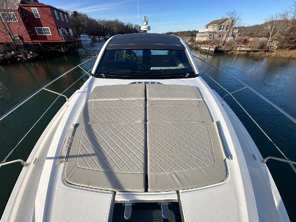 Slide: The Image of 2024 Fairline Targa 45 Open luxury yacht on a serene waterway. - 31