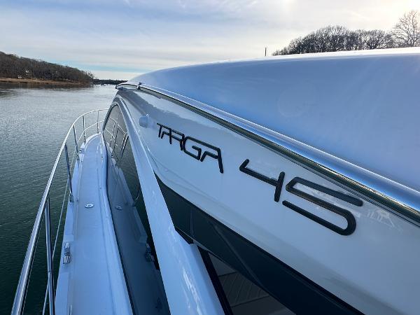 Slide: The Image of 2024 Fairline Targa 45 Open yacht on calm water. - 33