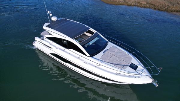 Slide: The Image of 2024 Fairline Targa 45 Open luxury yacht cruising on water. - 7