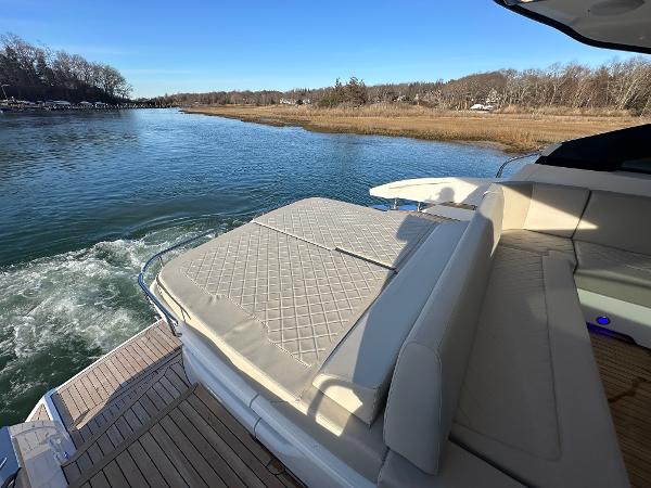 Slide: The Image of 2024 Fairline Targa 45 Open luxury yacht with spacious sun deck on calm waters. - 9