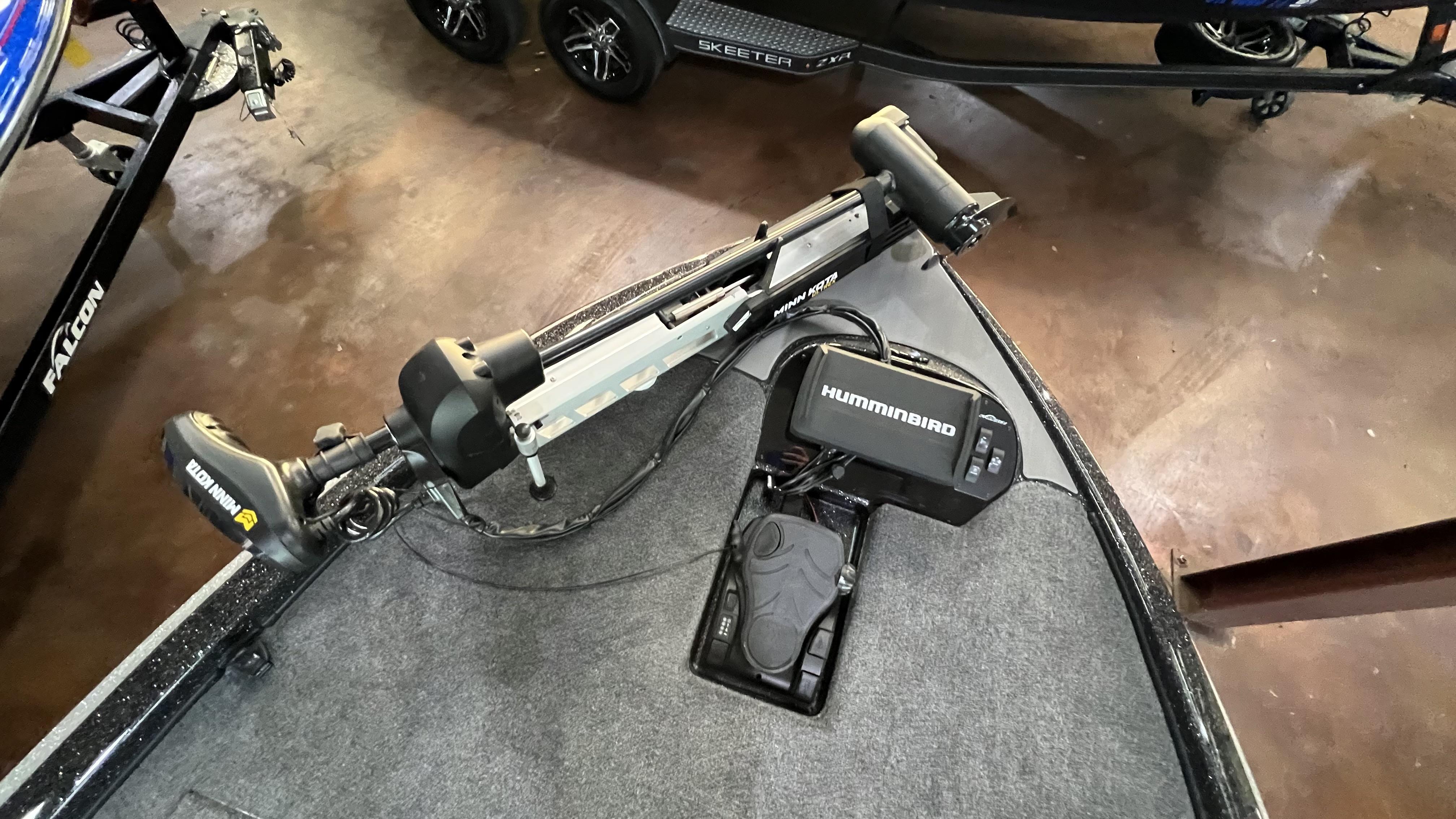 Slide: The Image of 2024 Falcon F205 boat with Minn Kota trolling motor and Humminbird fish finder. - 17