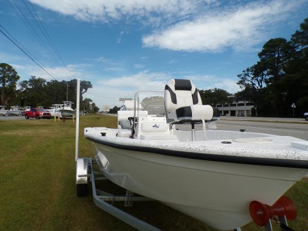 Slide: The Image of 2023 Fibercraft 160 Pro Vee boat on trailer, parked on grass near road. - 3