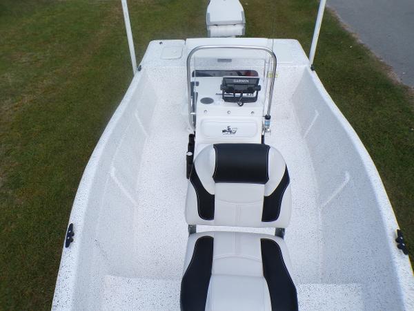 Slide: The Image of 2023 Fibercraft 160 Pro Vee boat interior with dual seats and console. - 5