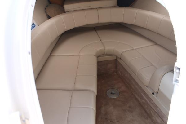 Slide: The Image of 2001 Formula 260 Sun Sport cabin with beige seating and carpeted floor. - 12
