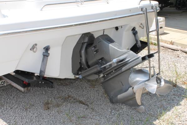 Slide: The Image of 2001 Formula 260 Sun Sport boat stern with outboard motor and propeller. - 2