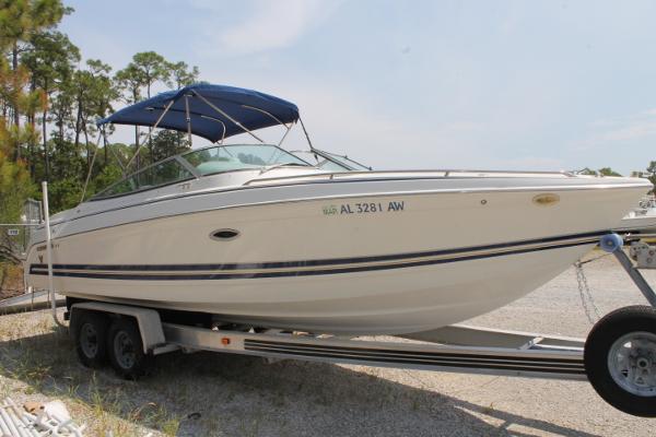 Slide: The Image of 2001 Formula 260 Sun Sport boat on trailer with blue canopy. - 6