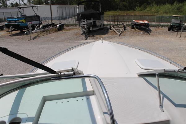 Slide: The Image of 2001 Formula 260 Sun Sport boat in storage yard with other vehicles. - 9