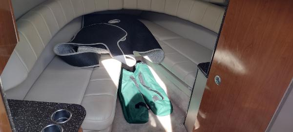 Slide: The Image of Interior cabin of a 2004 Formula 280 Sun Sport boat with seating and storage. - 11