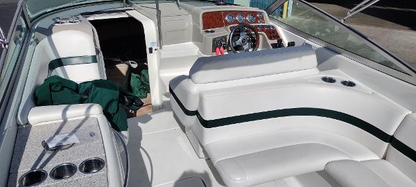Slide: The Image of 2004 Formula 280 Sun Sport boat interior with white seating and dashboard. - 7