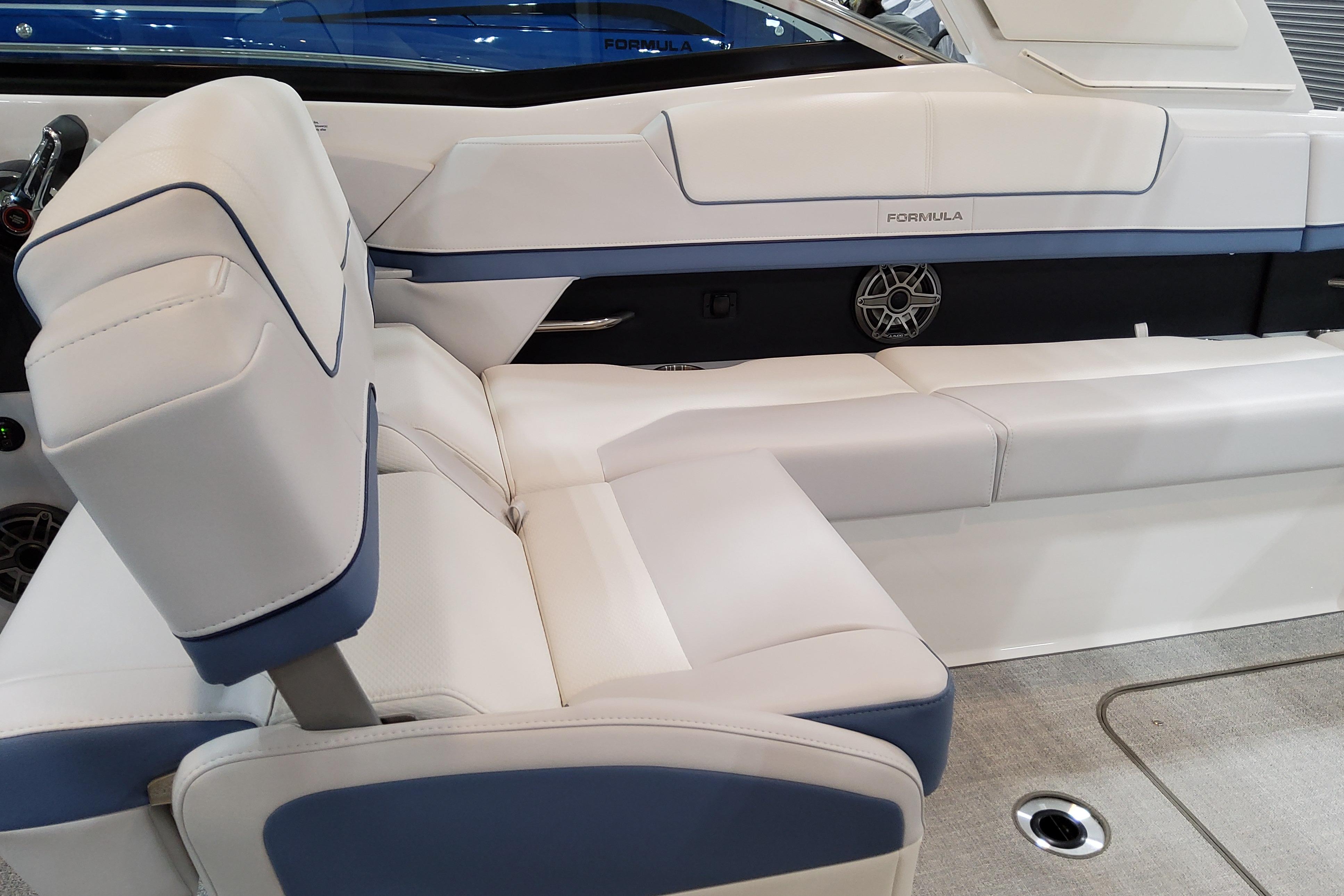 Slide: The Image of 2026 Formula 310 Bowrider OB interior with luxurious white and blue seating. - 14