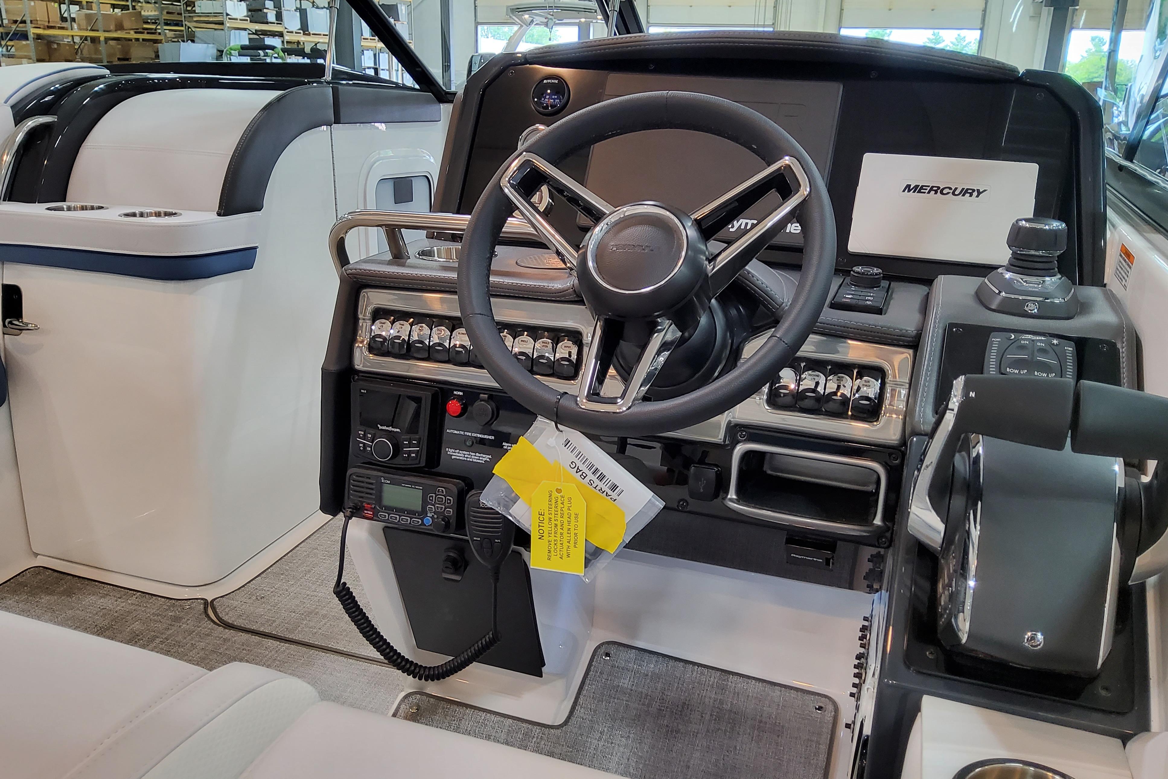 Slide: The Image of 2026 Formula 310 Bowrider OB cockpit with modern steering and control panel. - 16