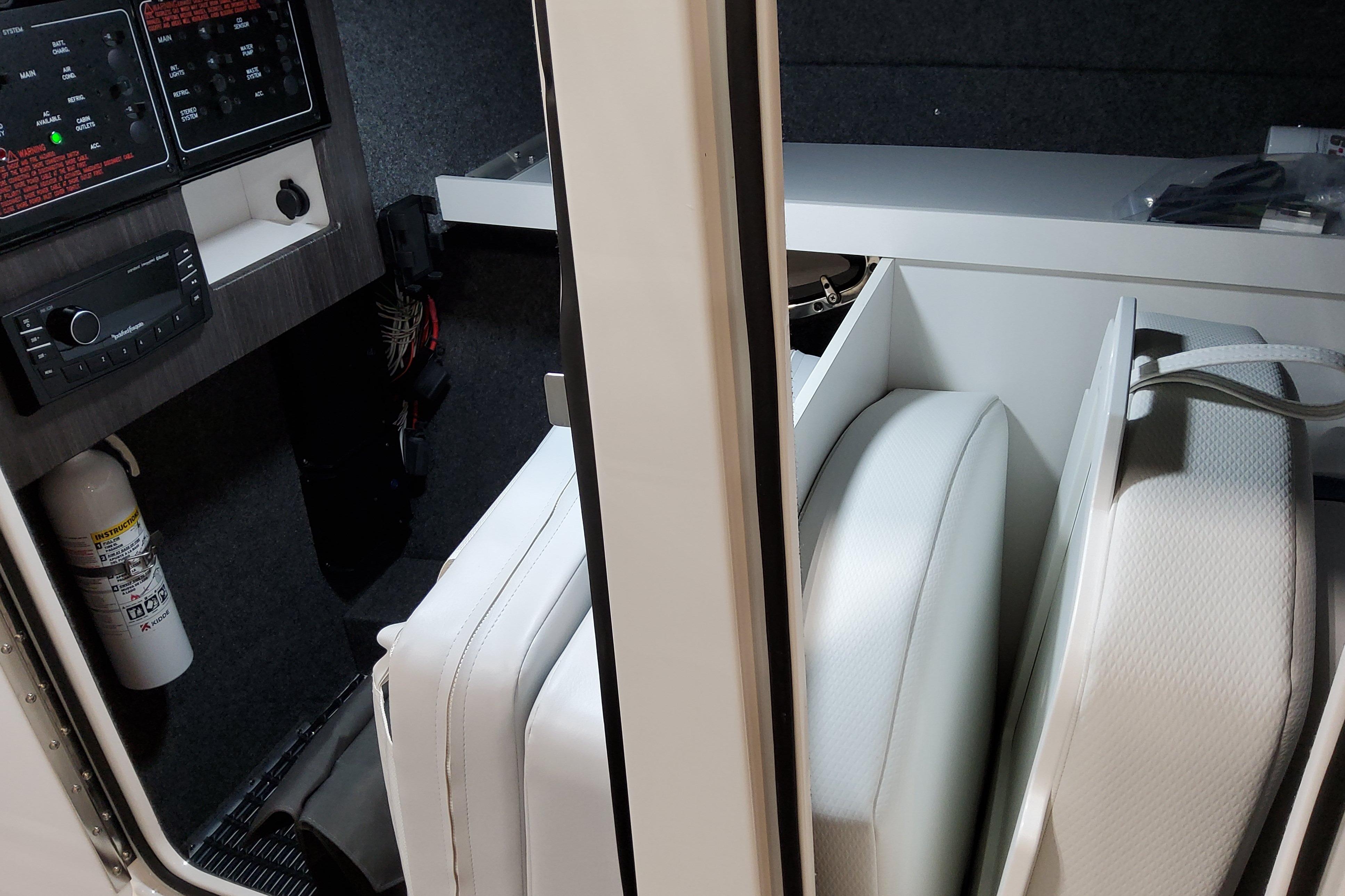 Slide: The Image of Interior of 2026 Formula 310 Bowrider OB, featuring control panel and white seating. - 23