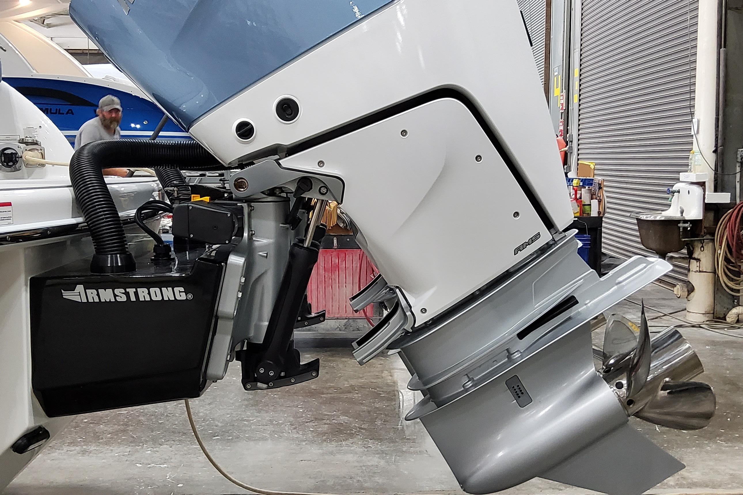 Slide: The Image of Outboard motor of 2026 Formula 310 Bowrider OB in a workshop setting. - 7