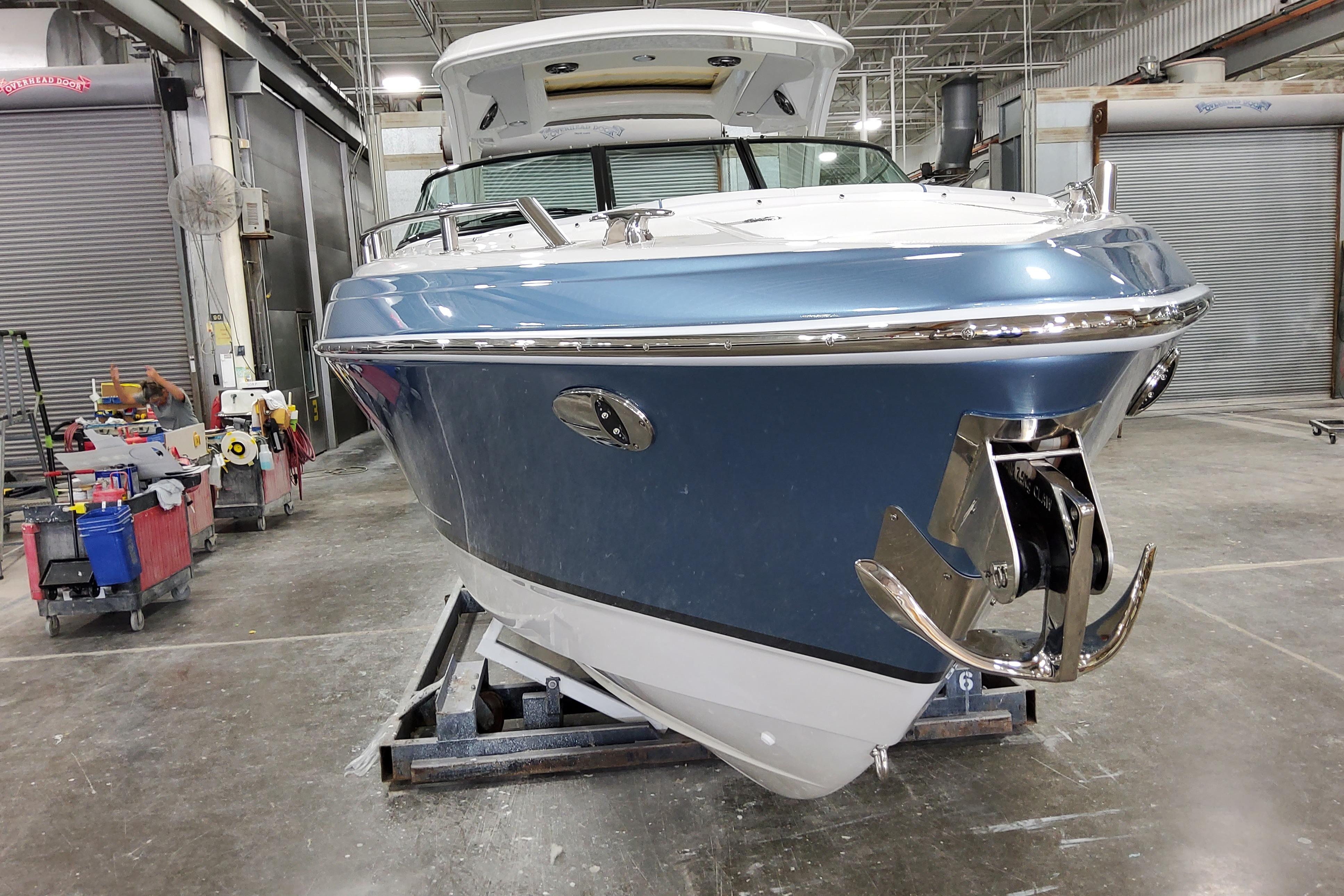 Slide: The Image of 2026 Formula 310 Bowrider OB in a workshop, showcasing sleek design and modern features. - 8