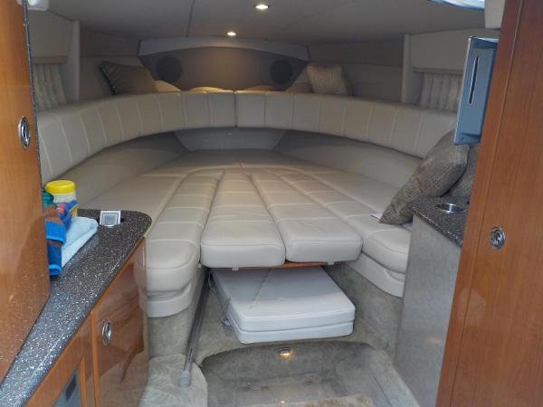 Slide: The Image of Interior cabin of 2006 Formula 330 SS boat with plush seating and modern amenities. - 3