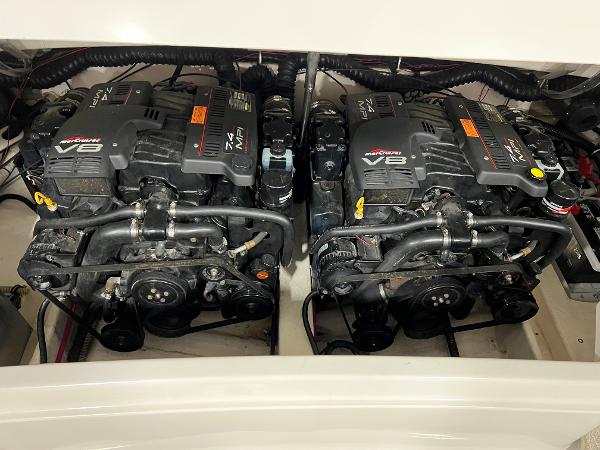 Slide: The Image of Twin V8 engines in a 1999 Formula 330 SS Sun Sport boat. - 13