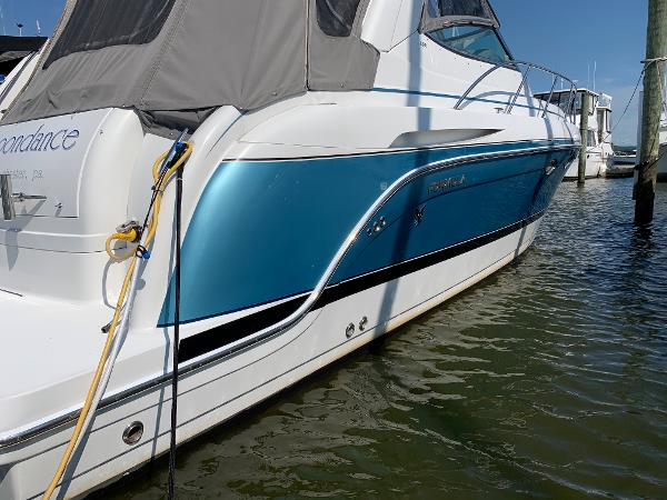 Slide: The Image of 2005 Formula 34 PC boat docked in marina. - 32