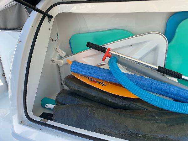 Slide: The Image of Storage compartment of a 2005 Formula 34 PC boat with water sports equipment. - 34
