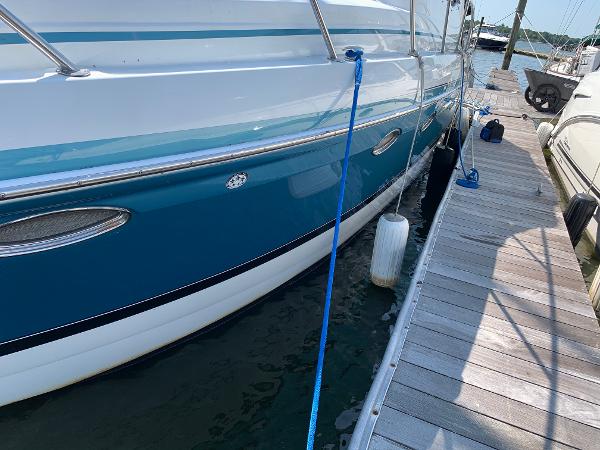 Slide: The Image of 2005 Formula 34 PC boat docked at a marina. - 39