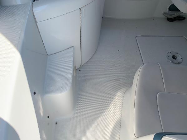 Slide: The Image of Interior of a 2005 Formula 34 PC boat showing seating and storage areas. - 45