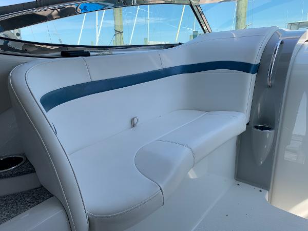Slide: The Image of 2005 Formula 34 PC boat interior seating with white and blue upholstery. - 46