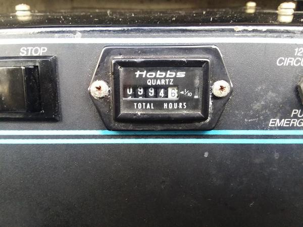 Slide: The Image of Hour meter on a 1990 Formula 36 PC boat showing 994.6 total hours. - 11