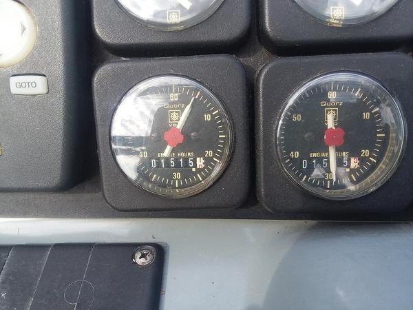 Slide: The Image of Close-up of engine hour meters on a 1990 Formula 36 PC boat. - 9