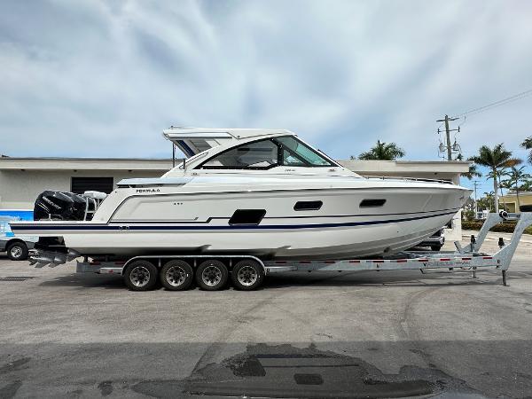 Slide: The Image of 2021 Formula 380 SSC boat on a trailer, side view. - 1