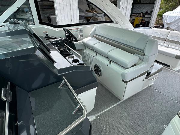 Slide: The Image of 2021 Formula 380 SSC boat interior with modern helm and seating area. - 19