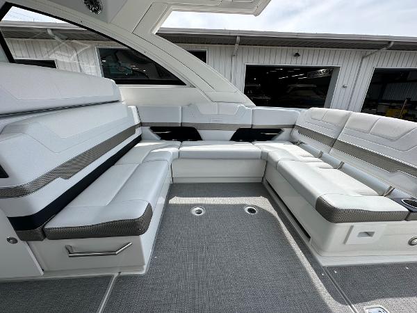Slide: The Image of 2021 Formula 380 SSC boat interior with spacious white seating. - 21