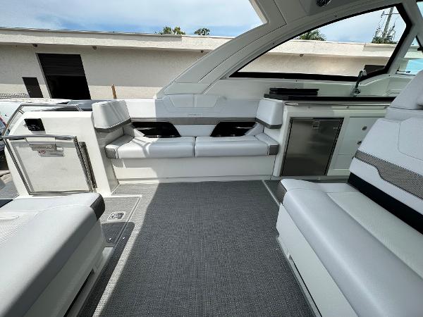 Slide: The Image of 2021 Formula 380 SSC boat interior with white seating and modern amenities. - 22