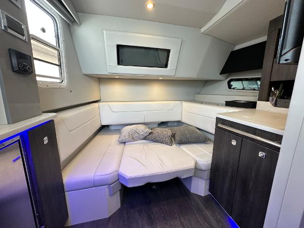 Slide: The Image of 2021 Formula 380 SSC cabin interior with modern seating and ambient lighting. - 23