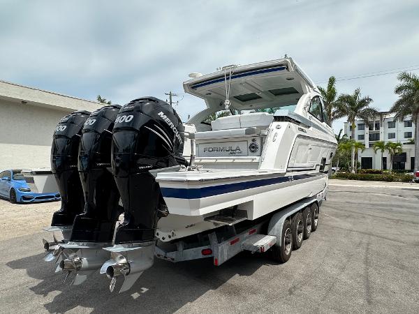 Slide: The Image of 2021 Formula 380 SSC boat with triple Mercury 400 engines on trailer. - 5