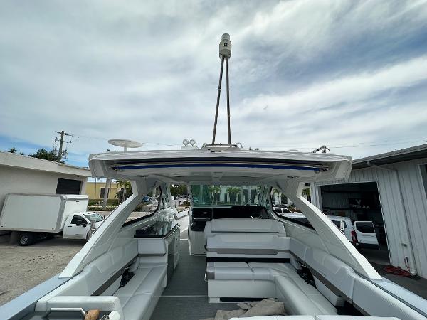 Slide: The Image of 2021 Formula 380 SSC luxury boat with spacious seating and modern design. - 7