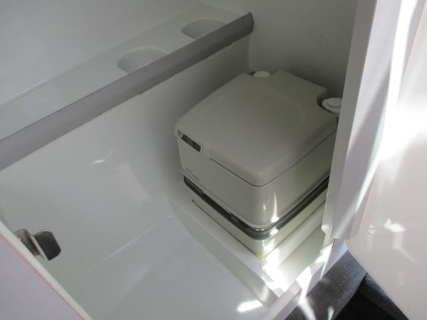 Slide: The Image of Portable toilet in the 1997 Formula 382 FASTech boat bathroom. - 28