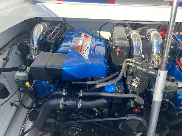 Slide: The Image of 1997 Formula 382 FASTech engine compartment with blue Mercury Racing engine. - 35
