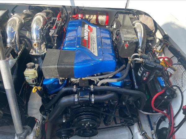 Slide: The Image of Engine of a 1997 Formula 382 FASTech boat with a blue MerCruiser Magnum engine. - 36