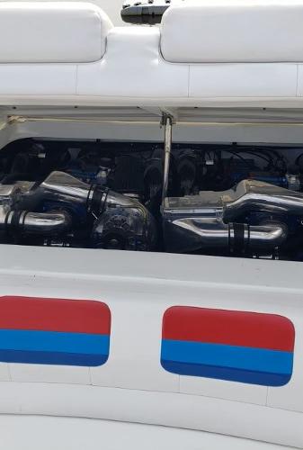 Slide: The Image of 2000 Formula 382 FASTech boat engine with red and blue accents. - 27