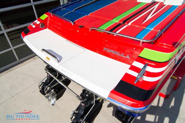 Slide: The Image of 2012 Formula 382 FASTech boat with colorful design at Big Thunder Marine. - 10