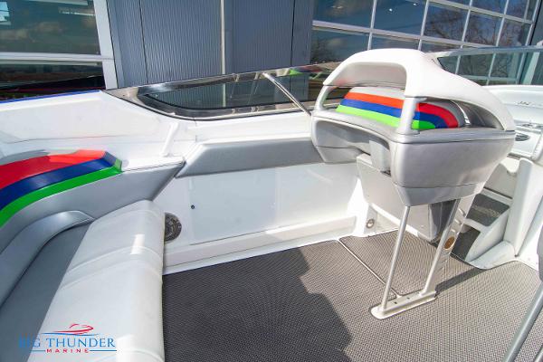 Slide: The Image of 2012 Formula 382 FASTech boat interior with colorful seating and modern design. - 15