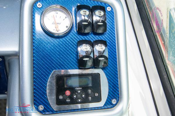 Slide: The Image of Control panel of a 2012 Formula 382 FASTech boat with gauges and switches. - 25