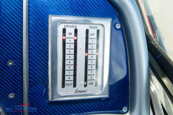 Slide: The Image of Control panel of a 2012 Formula 382 FASTech boat with drive and tab indicators. - 26