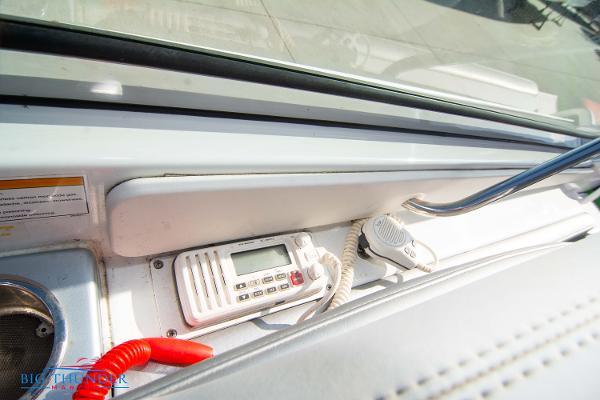 Slide: The Image of 2012 Formula 382 FASTech boat dashboard with radio and microphone. - 28