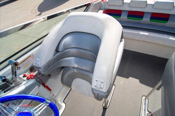 Slide: The Image of 2012 Formula 382 FASTech boat interior with helm seat and control panel. - 30