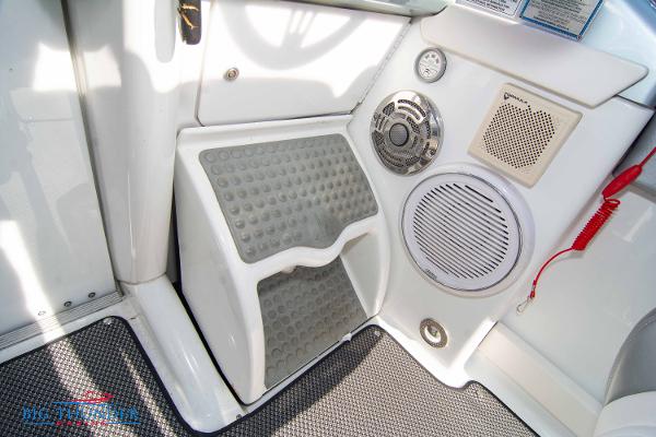 Slide: The Image of 2012 Formula 382 FASTech boat interior with footrest, speakers, and control panel. - 33