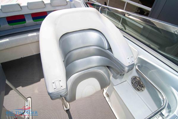 Slide: The Image of 2012 Formula 382 FASTech boat interior with cushioned seating and speaker. - 40